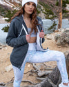 The cool ppl glacier leggings modeled in Colorado mountains on a hiking trail.
