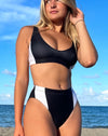 The cool ppl curved high waisted black and off white bikini.