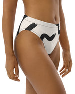 The Cool Ppl strokes in black and off white, high waisted bikini bottom from the Modern Lines swim collection front side view