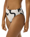 The Cool Ppl strokes in black and off white, high waisted bikini bottom from the Modern Lines swim collection side back view two
